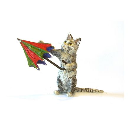 Katze mit buntem Schirm