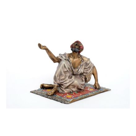 Arabischer Bettler auf Teppich